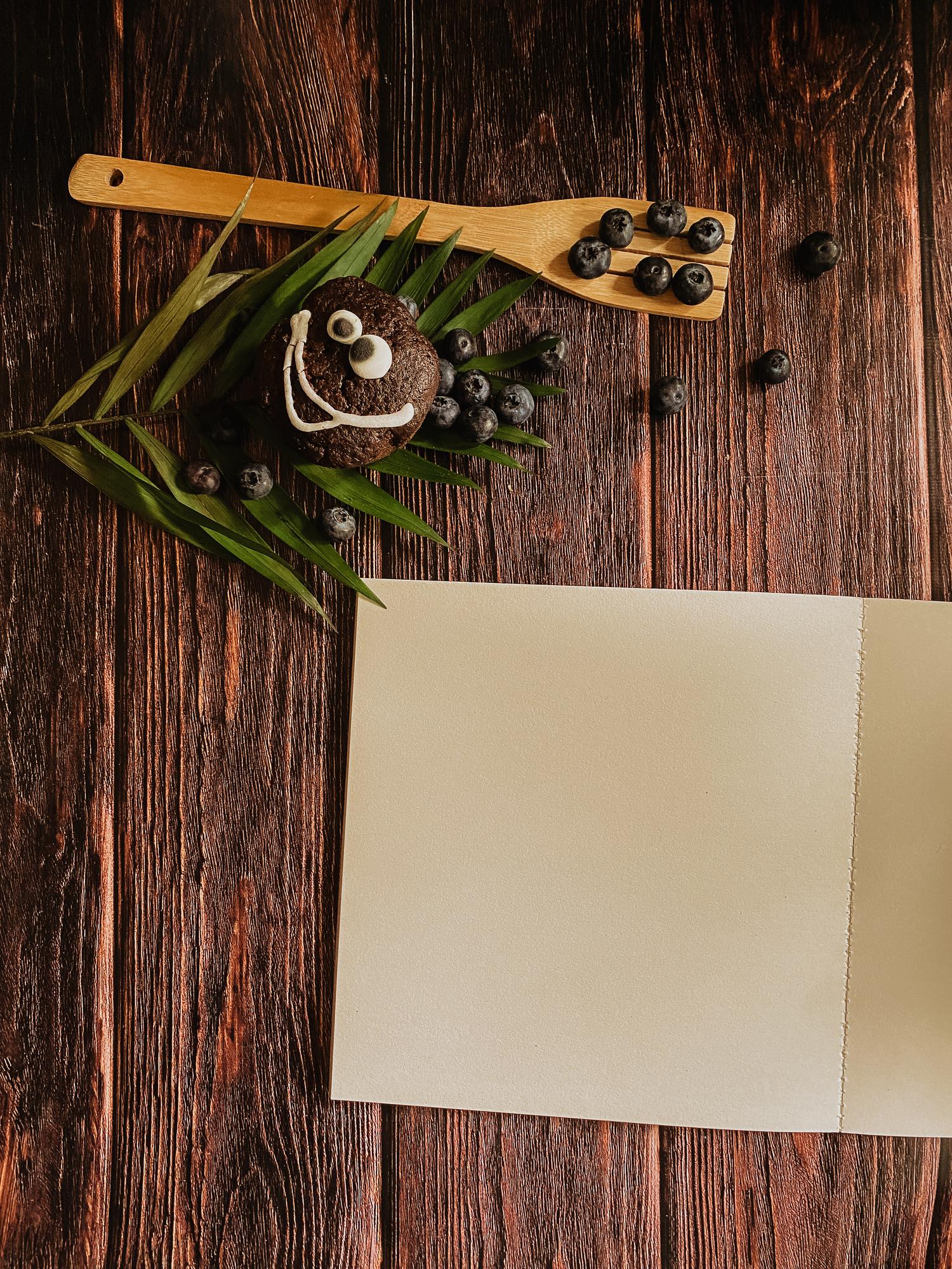 Sample menu cards laid out on wooden table